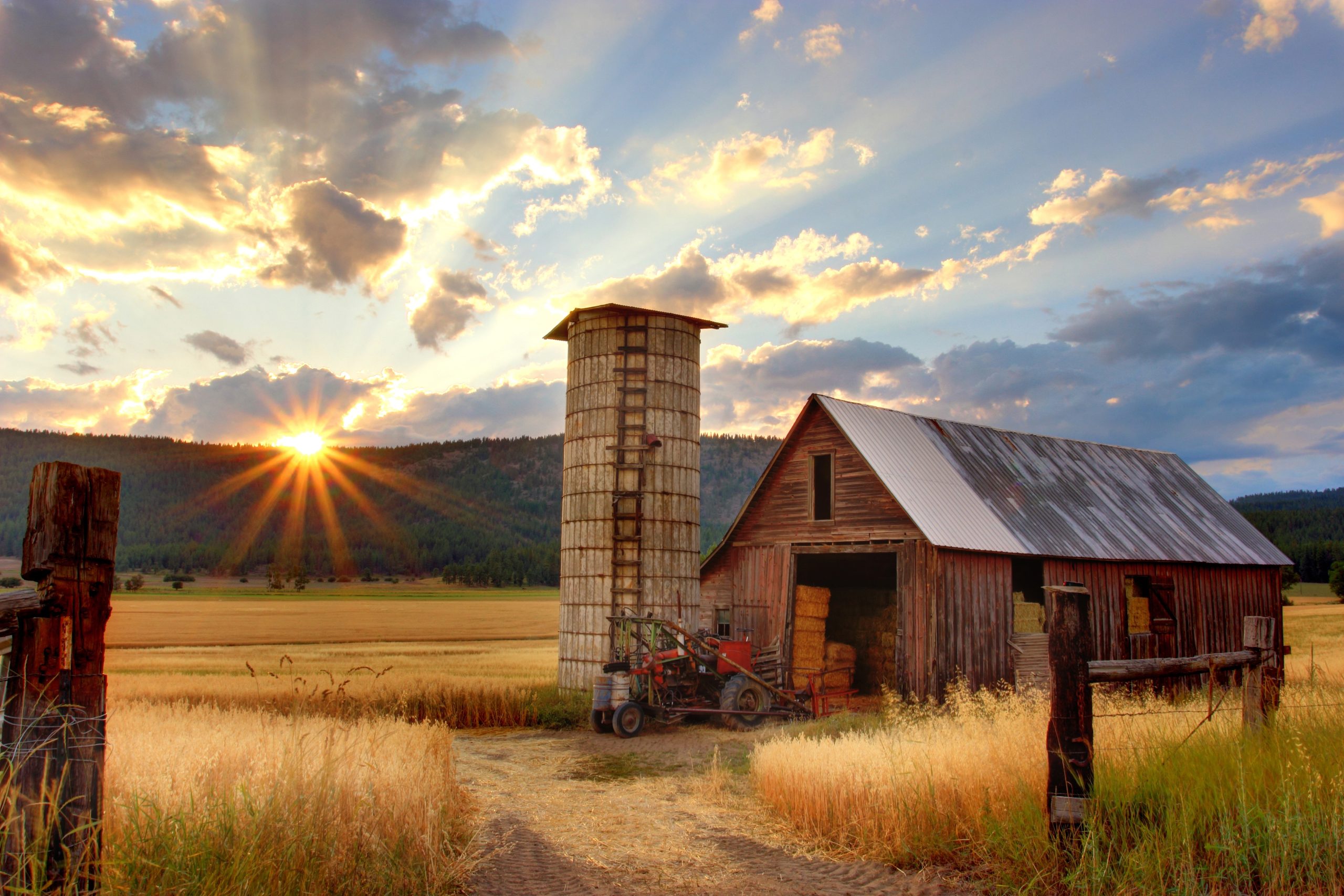 great pic of a sunset on a farm...